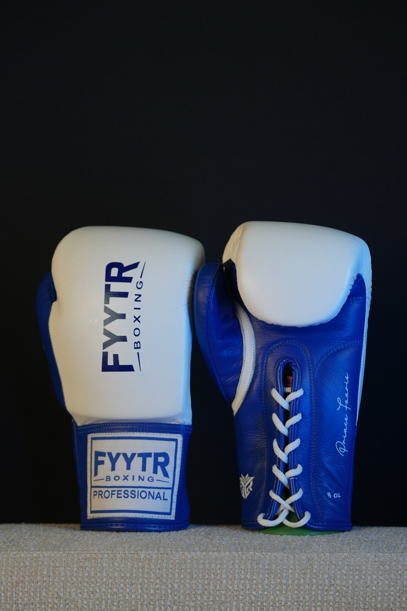 Blue and white FYYTR professional lace up boxing gloves