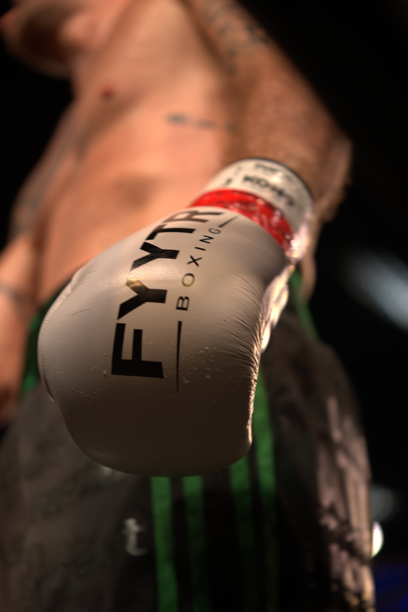 A worn pair of boxing gloves after months of training